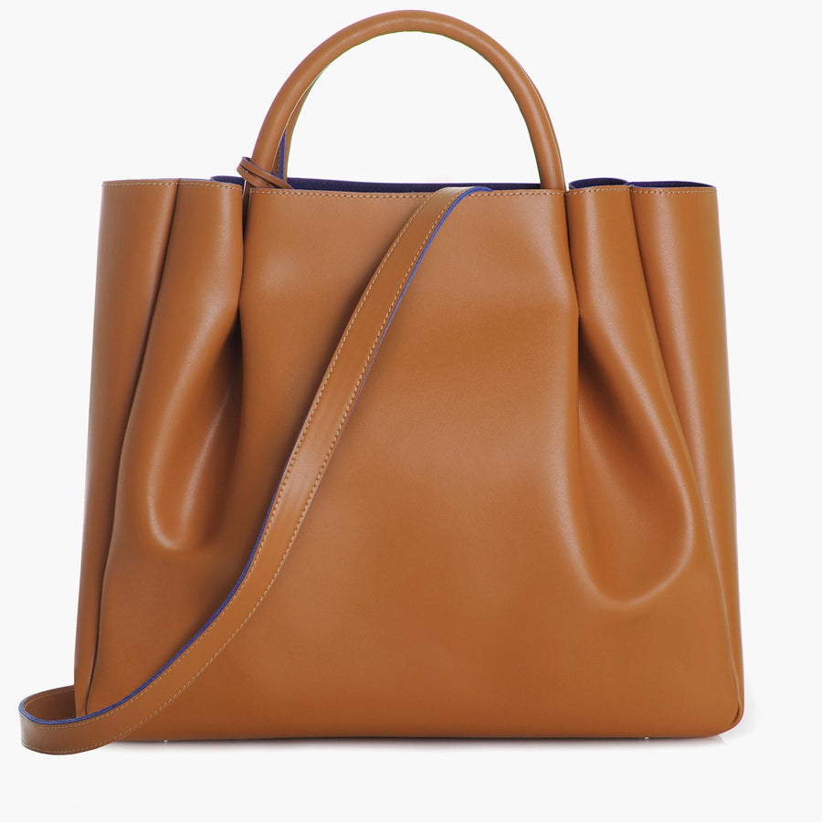 large tan cognac leather tote bag purse with shoulder strap