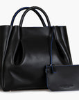 large black leather tote bag purse with small leather pouch
