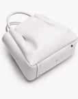 medium cream white leather tote bag purse with metal feet