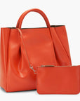 large orange leather tote bag purse with small pouch
