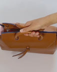 what fits inside cognac brown Loren medium bag purse